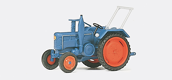 Tracteur agricole avec faucheuse