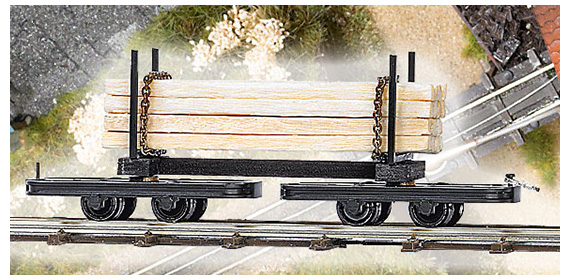 Die Feldbahn voies étroites‚ wagonnet à ranchers et à bogies pivotants‚ chargé de planches de bois