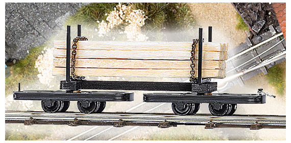 Die Feldbahn voies troites wagonnet  ranchers et  bogies pivotants charg de planches de bois