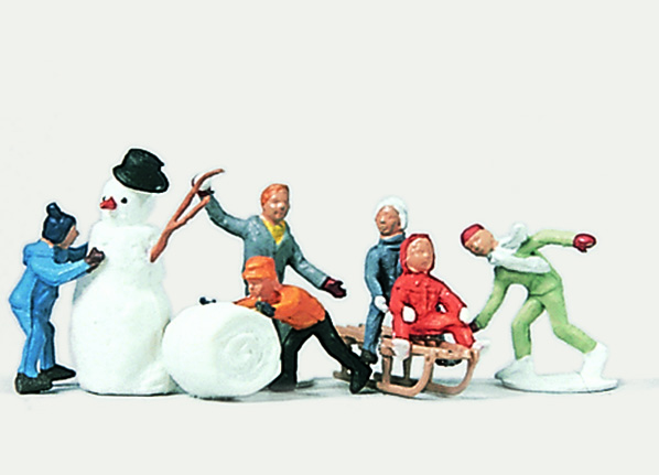 6 enfants un bonhomme de neige une luge  nouveau disponible le ??