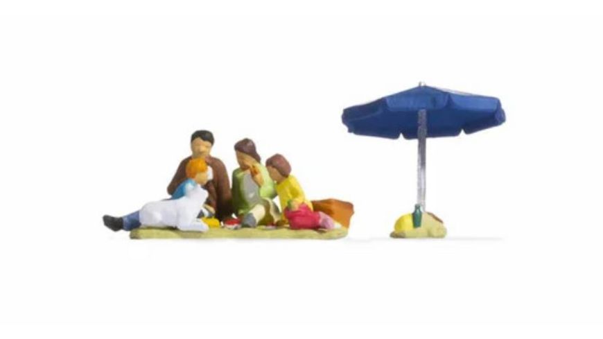 Famille en Picnick‚ parasol etc