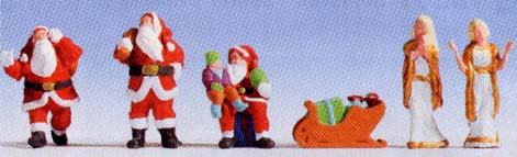 Figurines de Noël‚ 3 Père Noël ‚ 1 traineau‚ 1 enfant‚ 2 femmes‚ ( prix conseillé=11.99€)