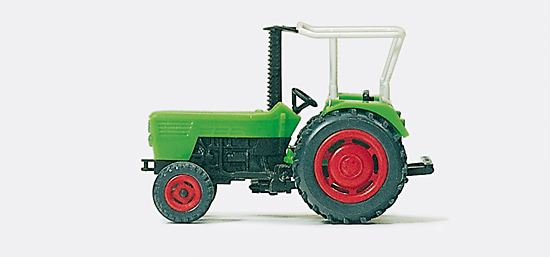 Tracteur agricole avec faucheuse latérale