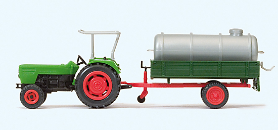 Tracteur agricole DEUTZ D avec remorque charge dune citerne