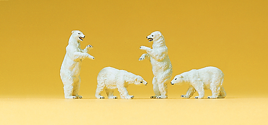 4 ours blancs‚ 2 à quatre pattes et 2 verticaux